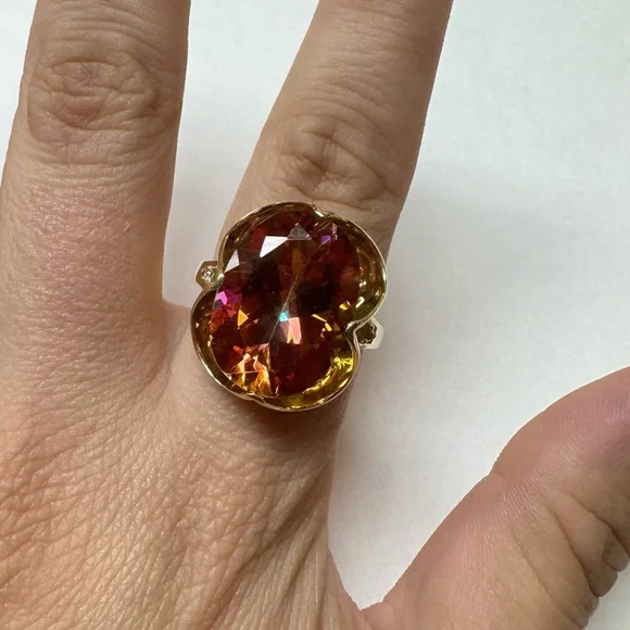 10k Yellow Gold 15ct Sunrise Topaz And .02ct Diamond Ring